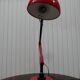 Red desk Guzzini lamp of the 1970s Italy