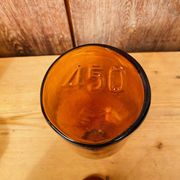 Trio of ancient apothecary bottles of beautiful amber color.