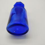 Old perfume bottle in cobalt blue glass
