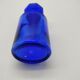 Old perfume bottle in cobalt blue glass