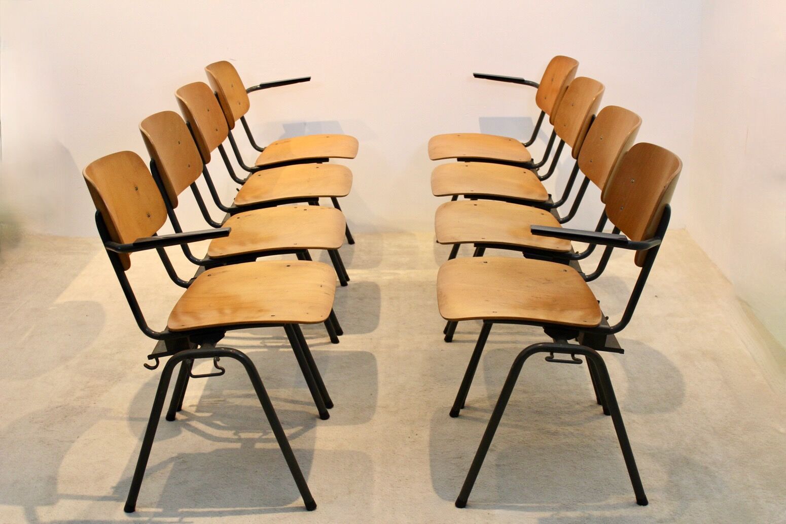 School bench consisting of 4 stackable chairs in industrial plywood by Marko Holland