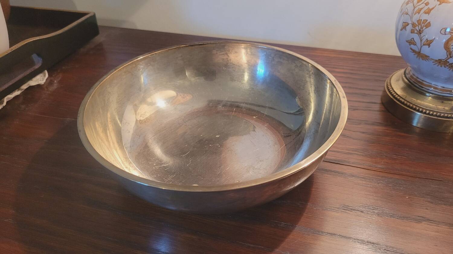 Silver cup, pocket emptier