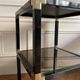 Pair of vintage metal and smoked glass side tables
