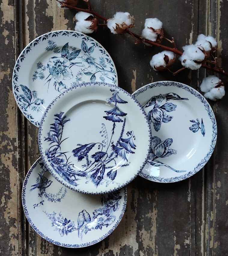 Set of four flat plates in iron earth