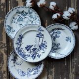 Set of four flat plates in iron earth