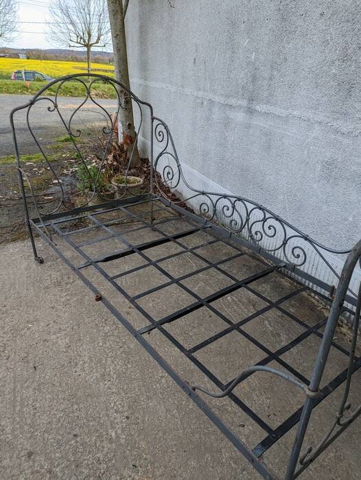 Metal folding bed, wrought iron bench