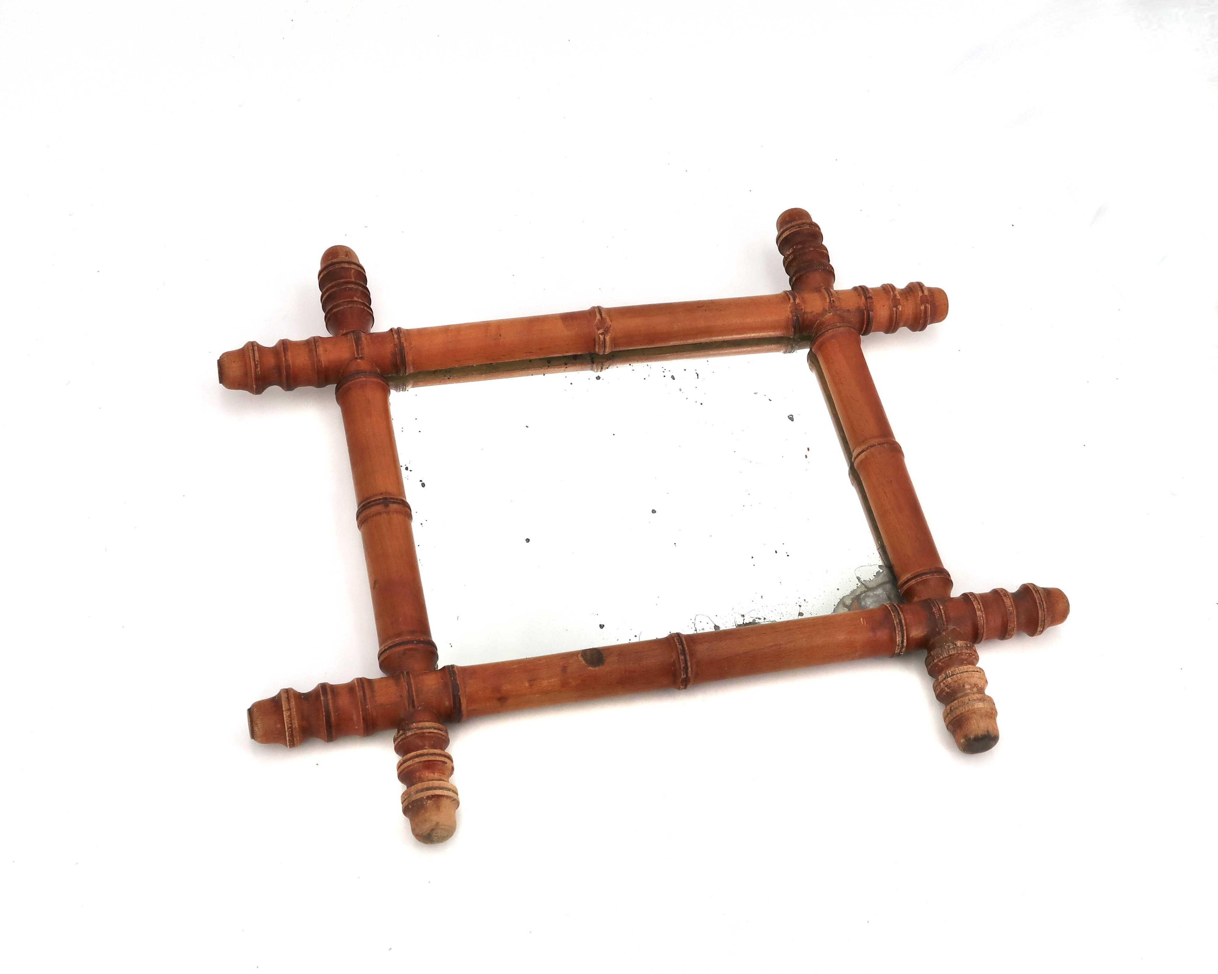 Small wall mirror in turned wood in a faux bamboo style, 1930s.