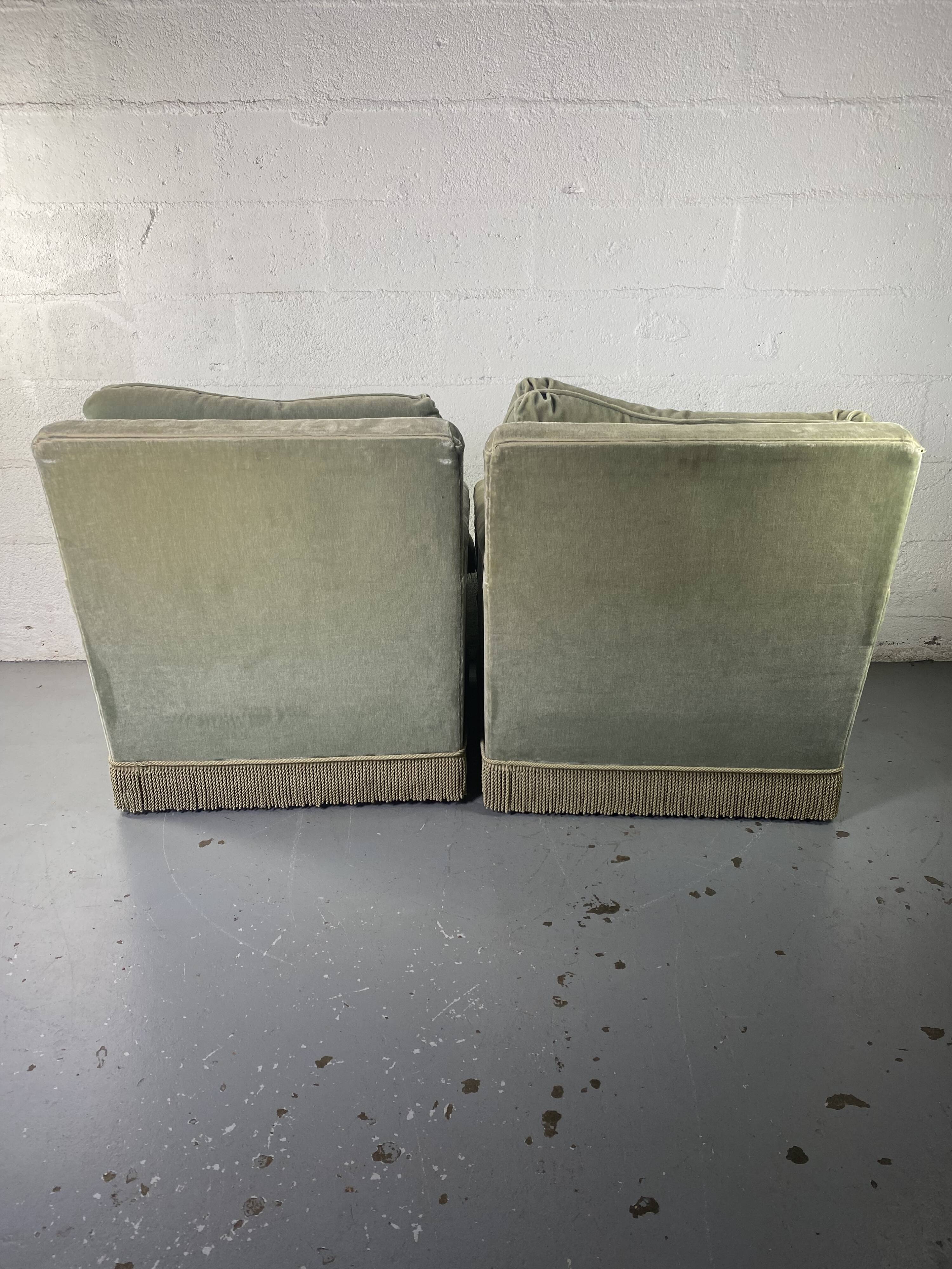 Pair of green velvet club armchairs