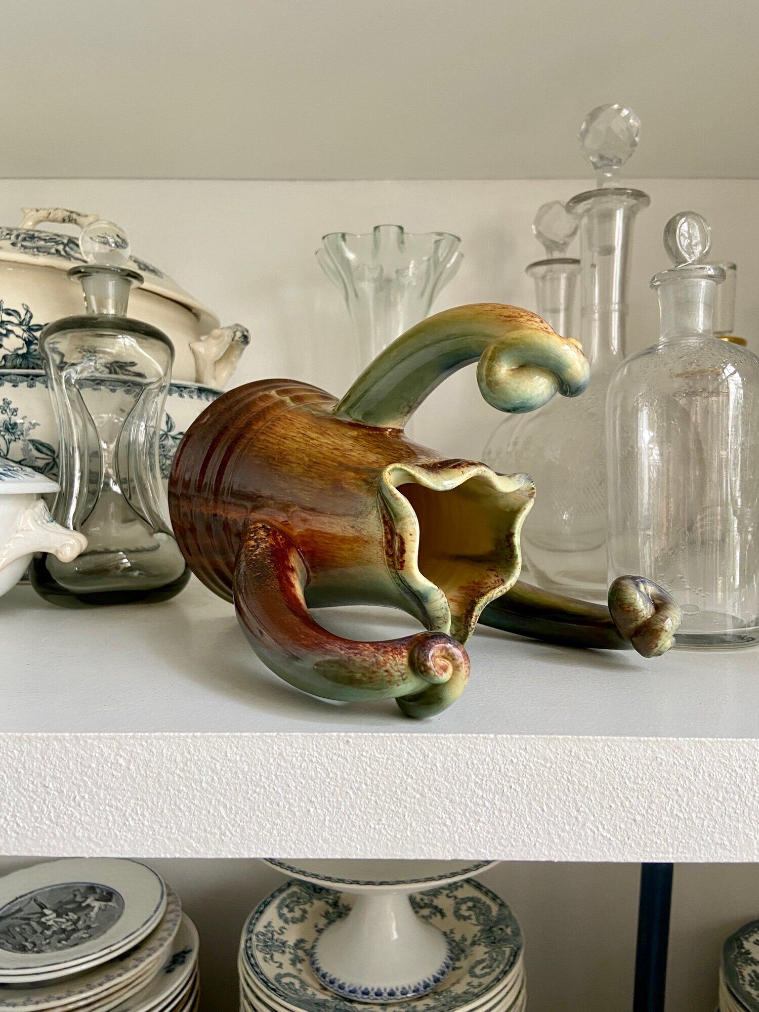 Turquoise glazed ceramic pitcher