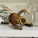 Turquoise glazed ceramic pitcher