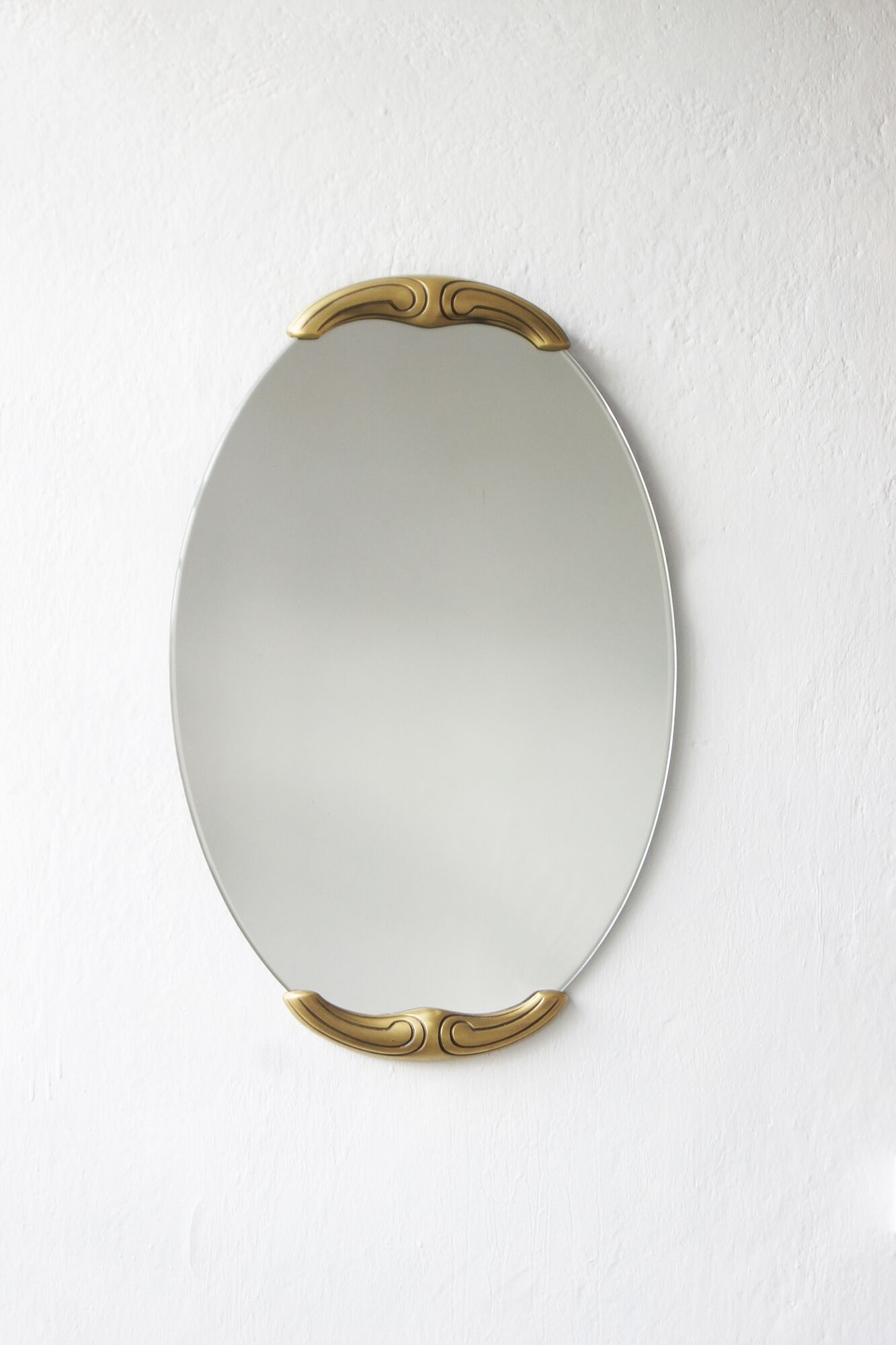 Miroir avec cadre en laiton 1960