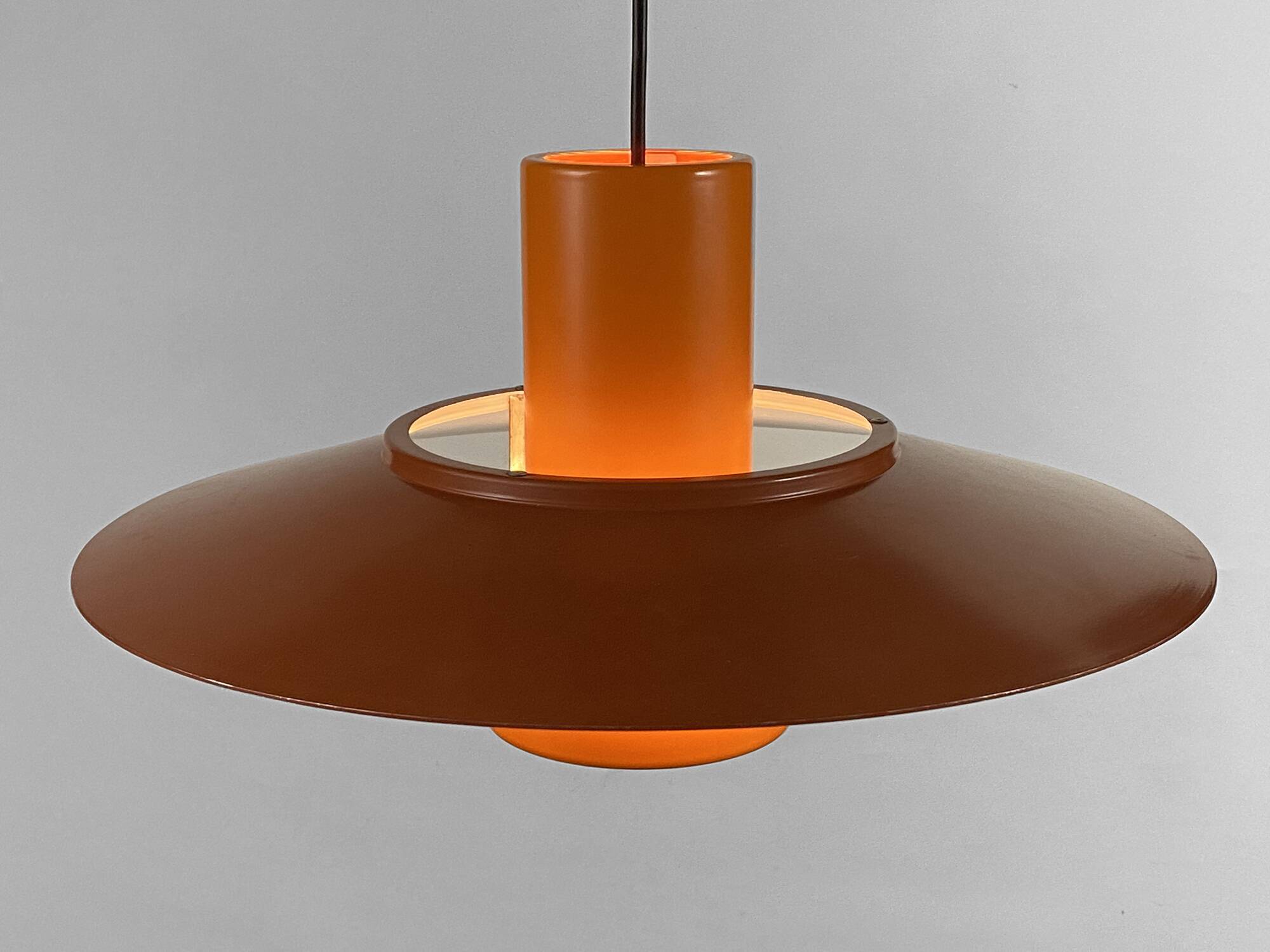 Pendant light "Falcon" two tone orange by Andreas Hansen for Fog & Mørup. Denmark 1960s.