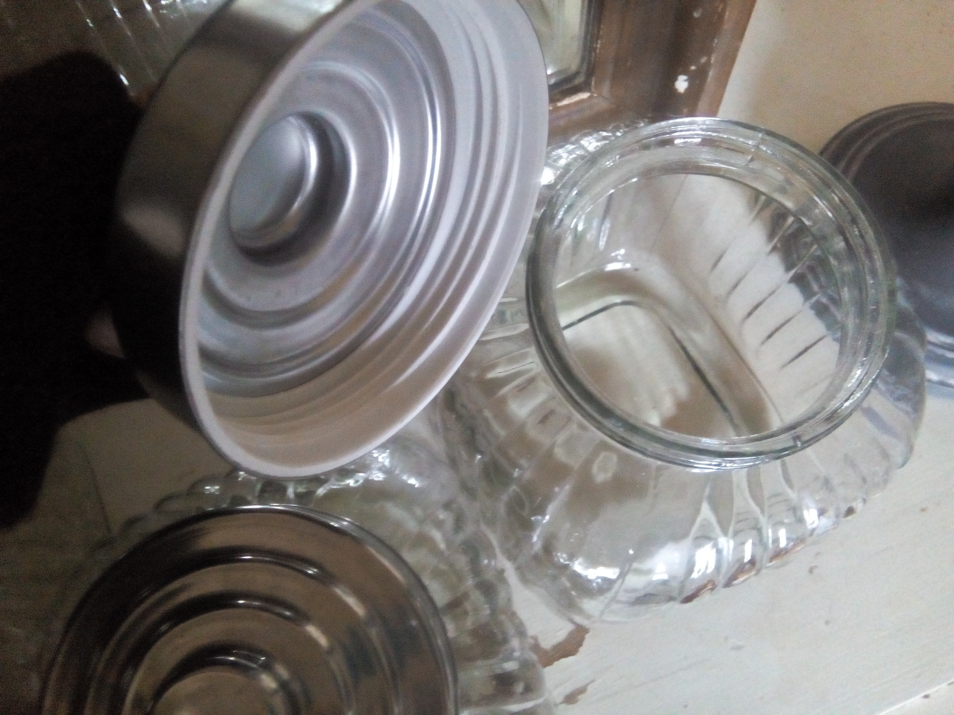 three large glass jars