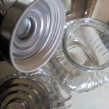 three large glass jars