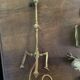 Rare articulated tripod base table lamp in gold-plated brass