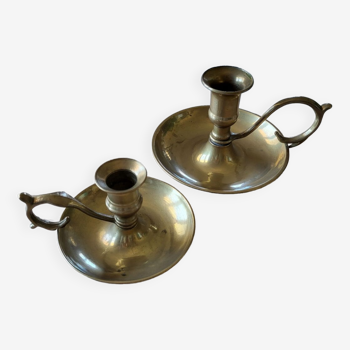 Pair of brass thumb candle holders