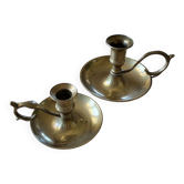 Paire de bougeoirs à poucier en laiton