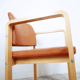 Fauteuil en cuir et en bois 1990