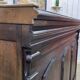 Early 20th-century oak bar counter with period zinc and tin cladding.