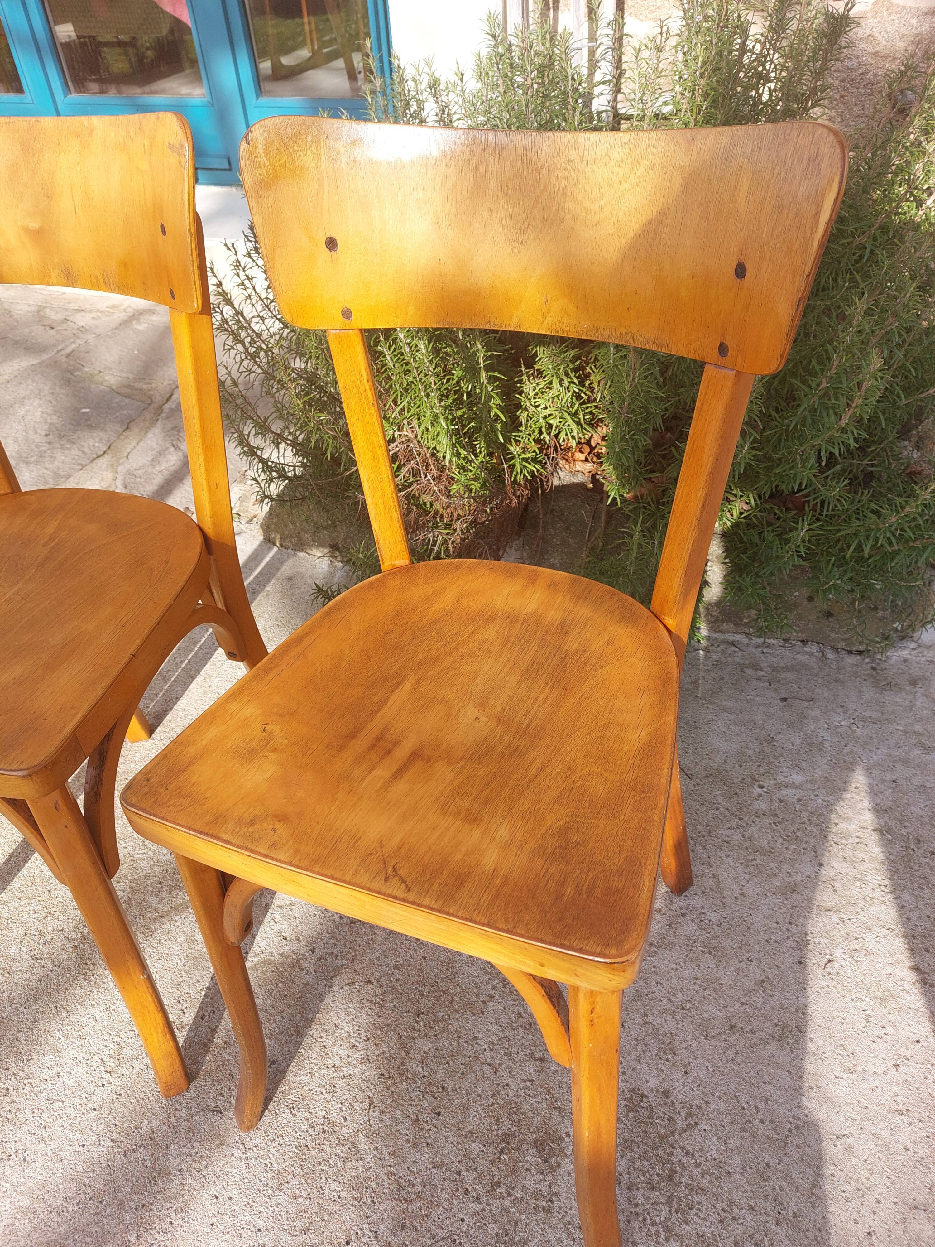 pair of Baumann bistro chairs