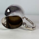 Water jug on feet decorated with ebony of hallmarked silver from the 1940s. The jug is in great anti