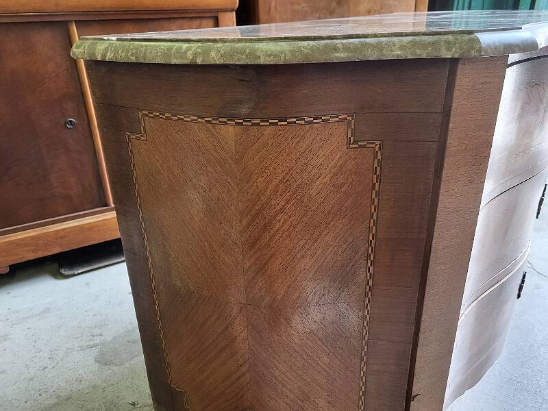 Curved chest of drawers in rosewood and marble marquetry