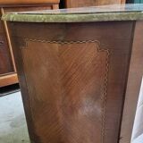 Curved chest of drawers in rosewood and marble marquetry