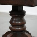 Elegant antique sheepskin leather desk chair with a heavy wooden frame