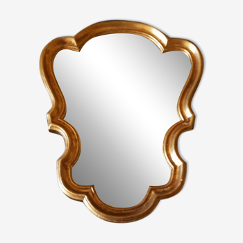Miroir style Louis XV en bois doré.