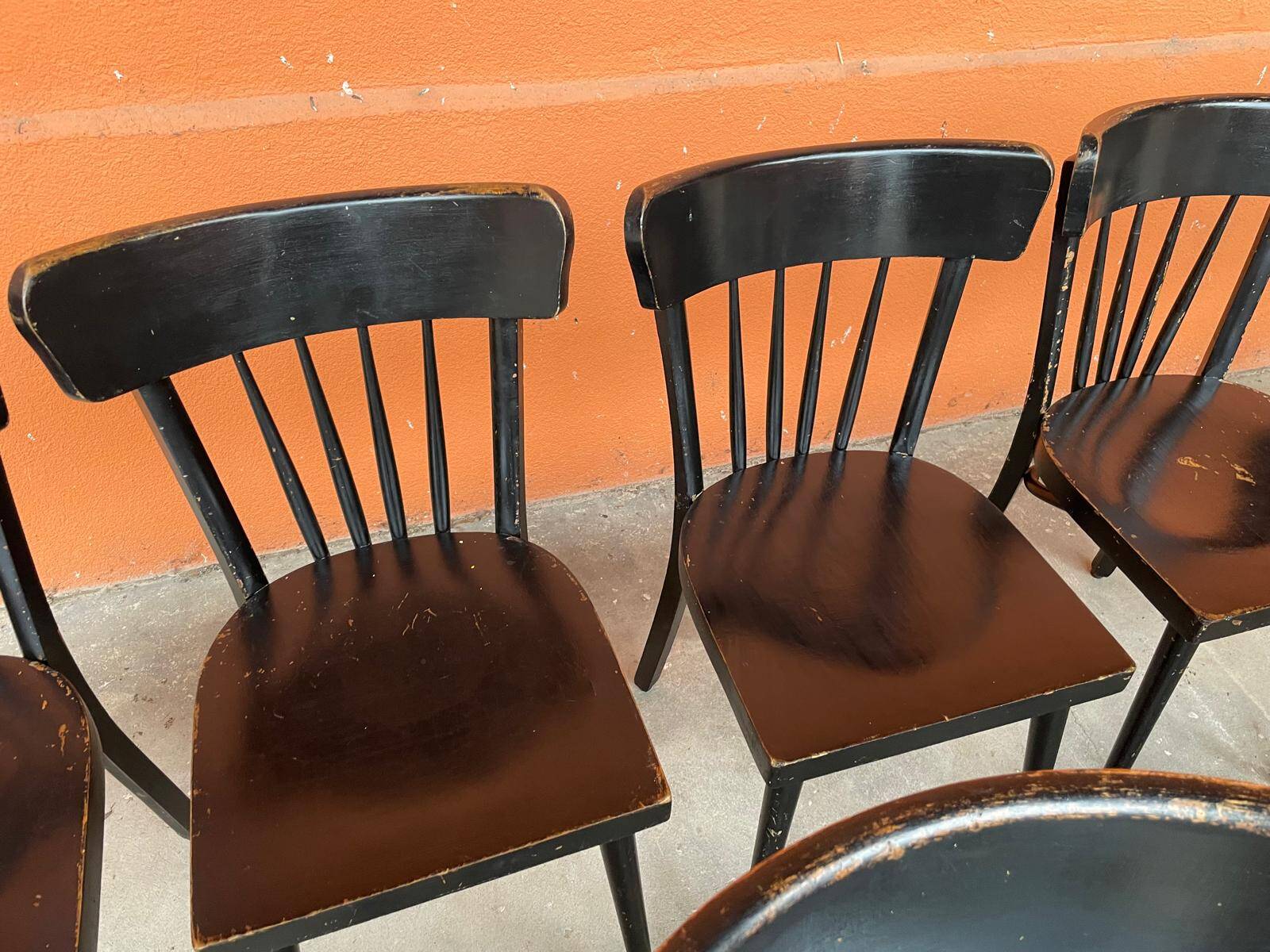 Set of 18 curved wooden bistro chairs with patina from the 60s