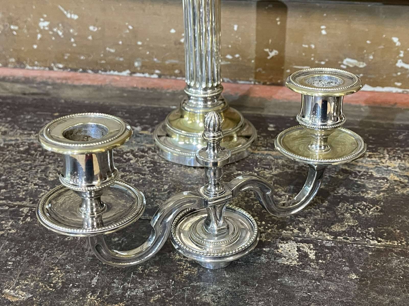Pair of 2-branched candlesticks in silver metal
