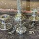 Pair of 2-branched candlesticks in silver metal