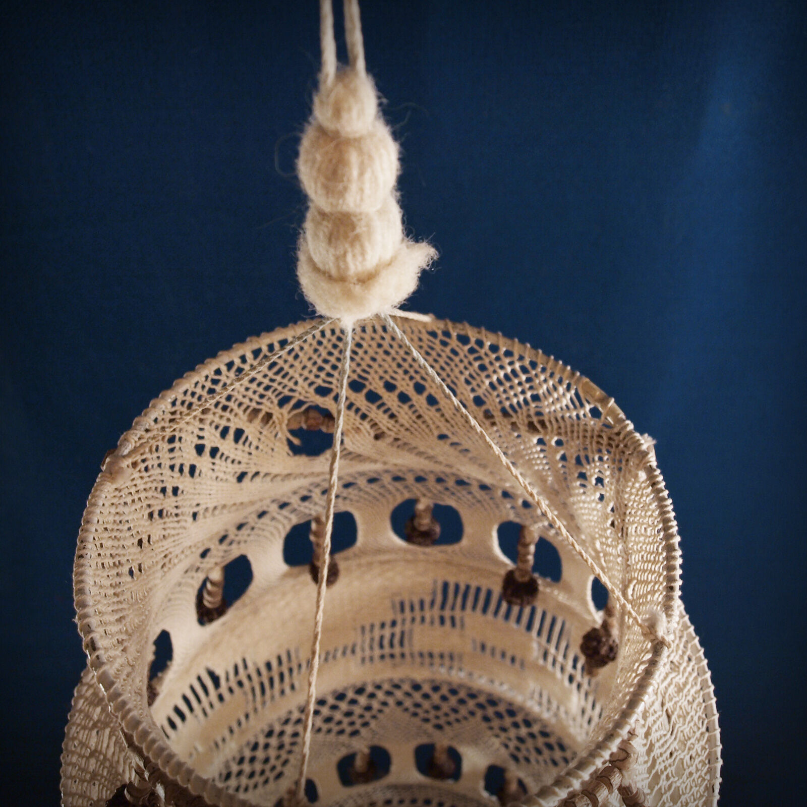 Crochet and wood chandelier
