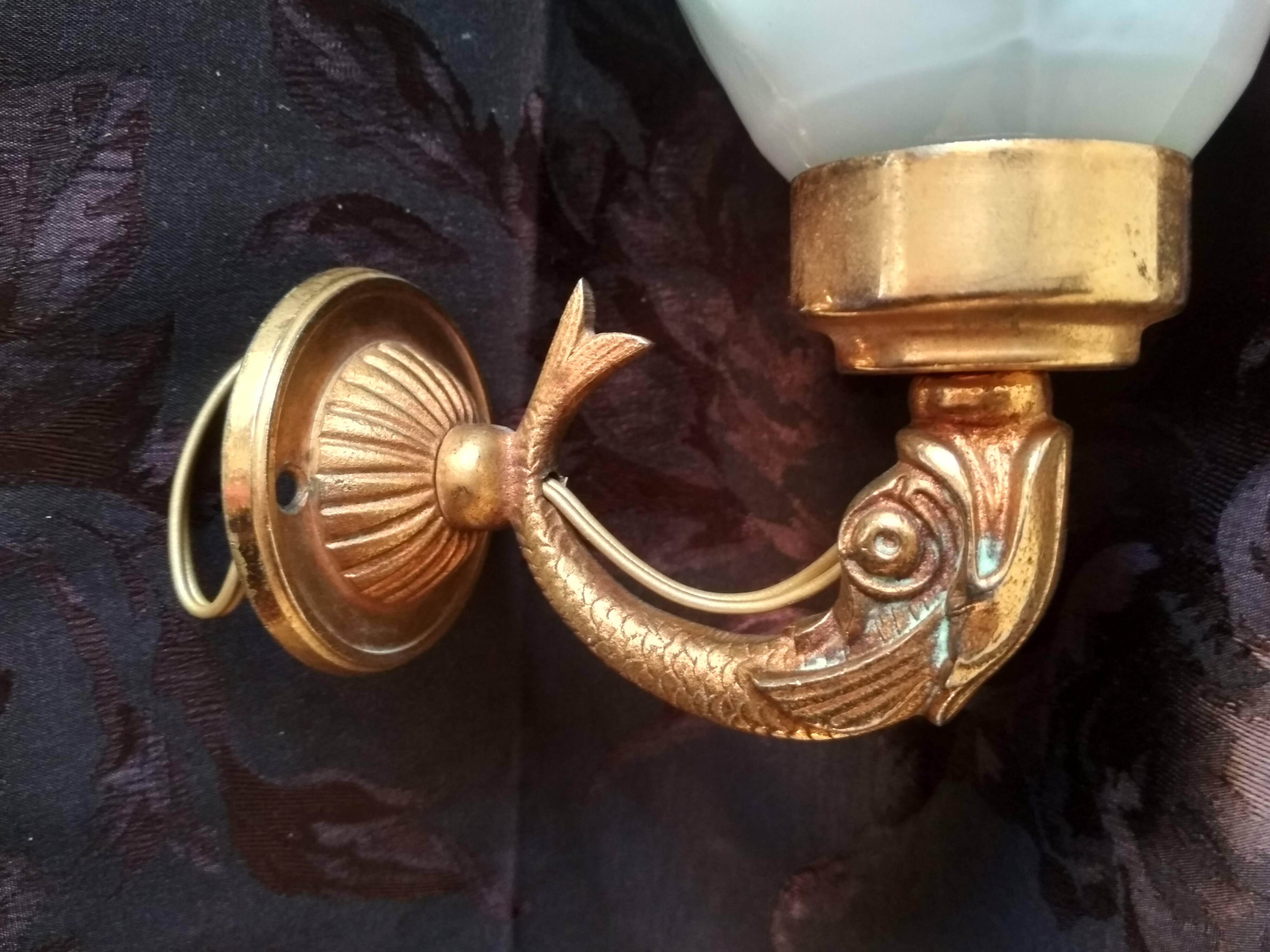 Golden brass wall light with glass tulip - dolphin pattern bathroom lamp