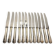 12 silver metal knives