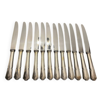 12 silver metal knives