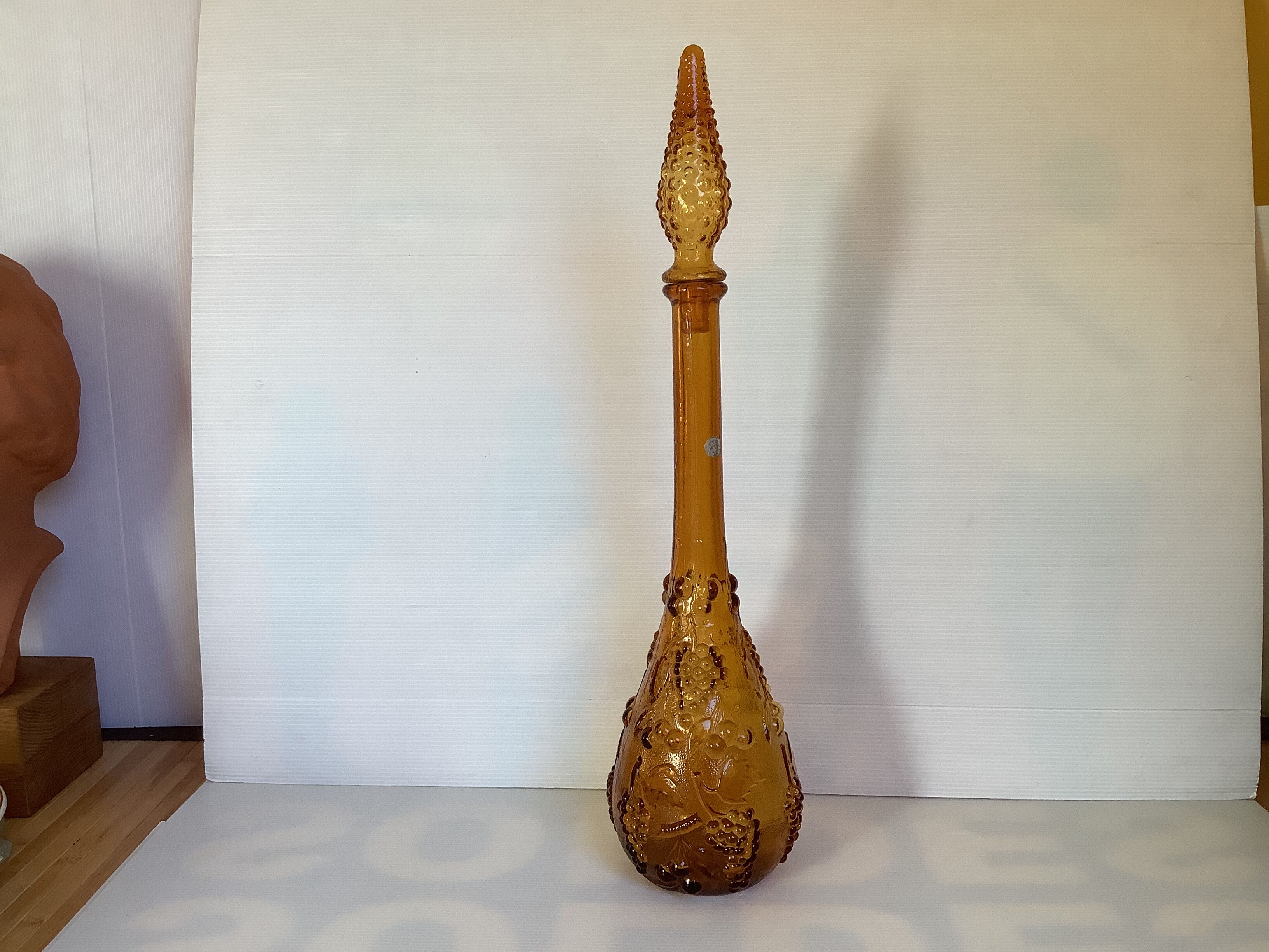 Yellow glass bottle Empoli Italy fruit pattern