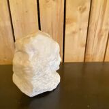 Sculpture woman face in marble block 1900