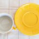 Apilco yellow and white porcelain chocolate cup and saucers