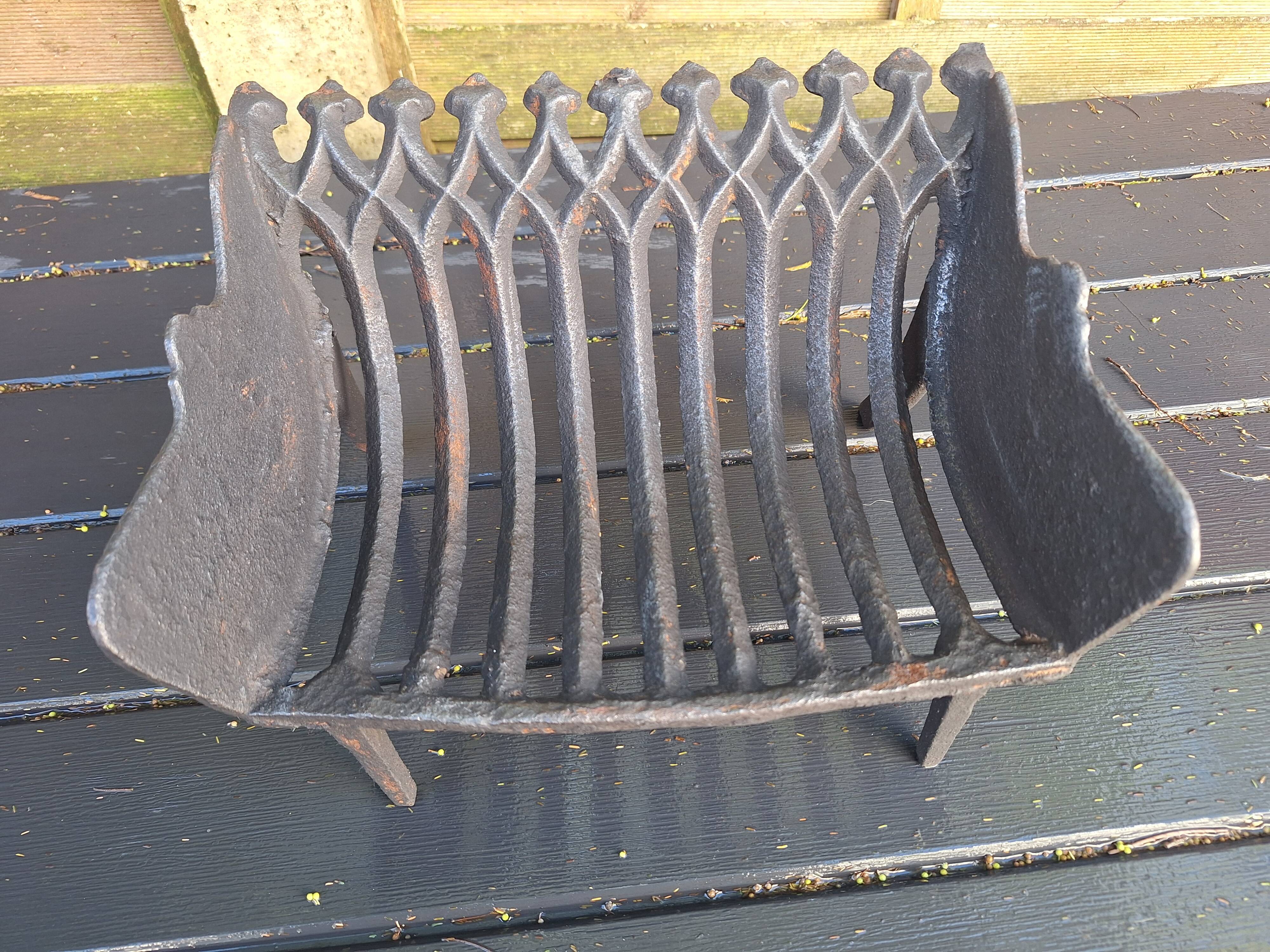 Antique cast iron log holder/ember holder for fireplace