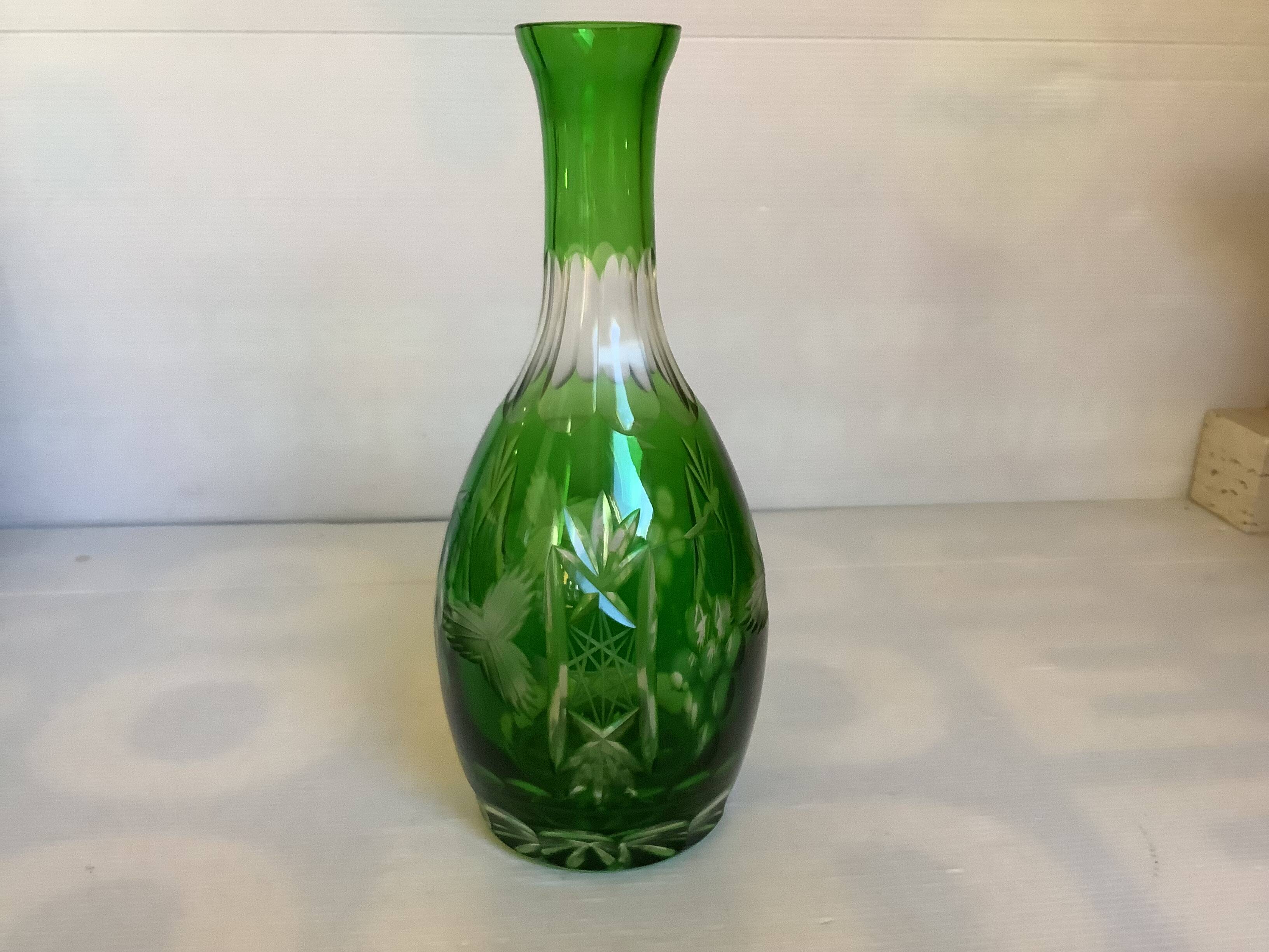 Green cut crystal bottle