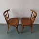 Pair of luterma curved wood bistro chairs