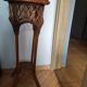 Woven wood and rattan plant stand