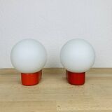 Pair of red Inda space age wall lights, opaline globe, 1970