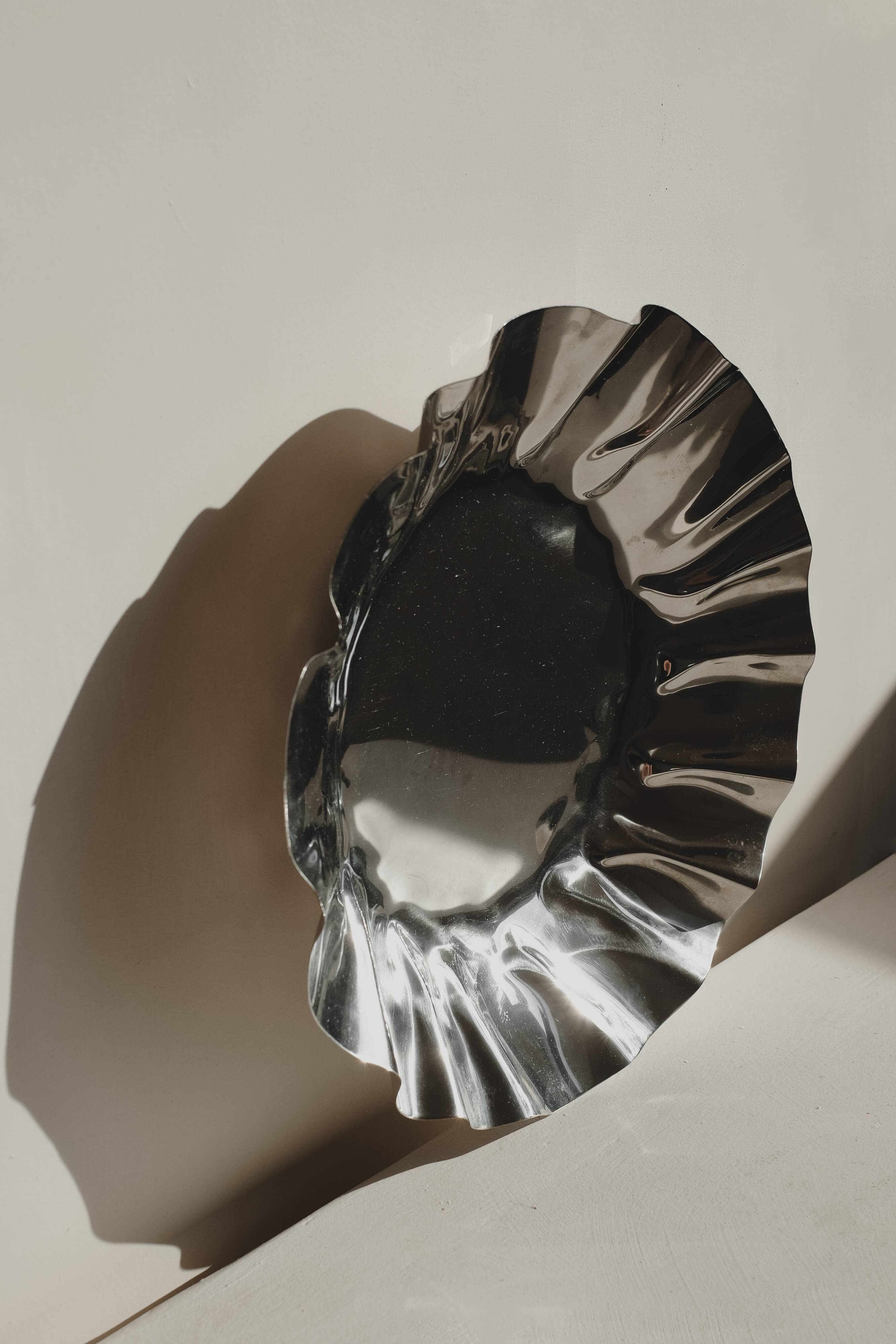 Large folded chrome bowl