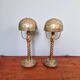 Pair of table lamps in bronze and brass, early 20th century.