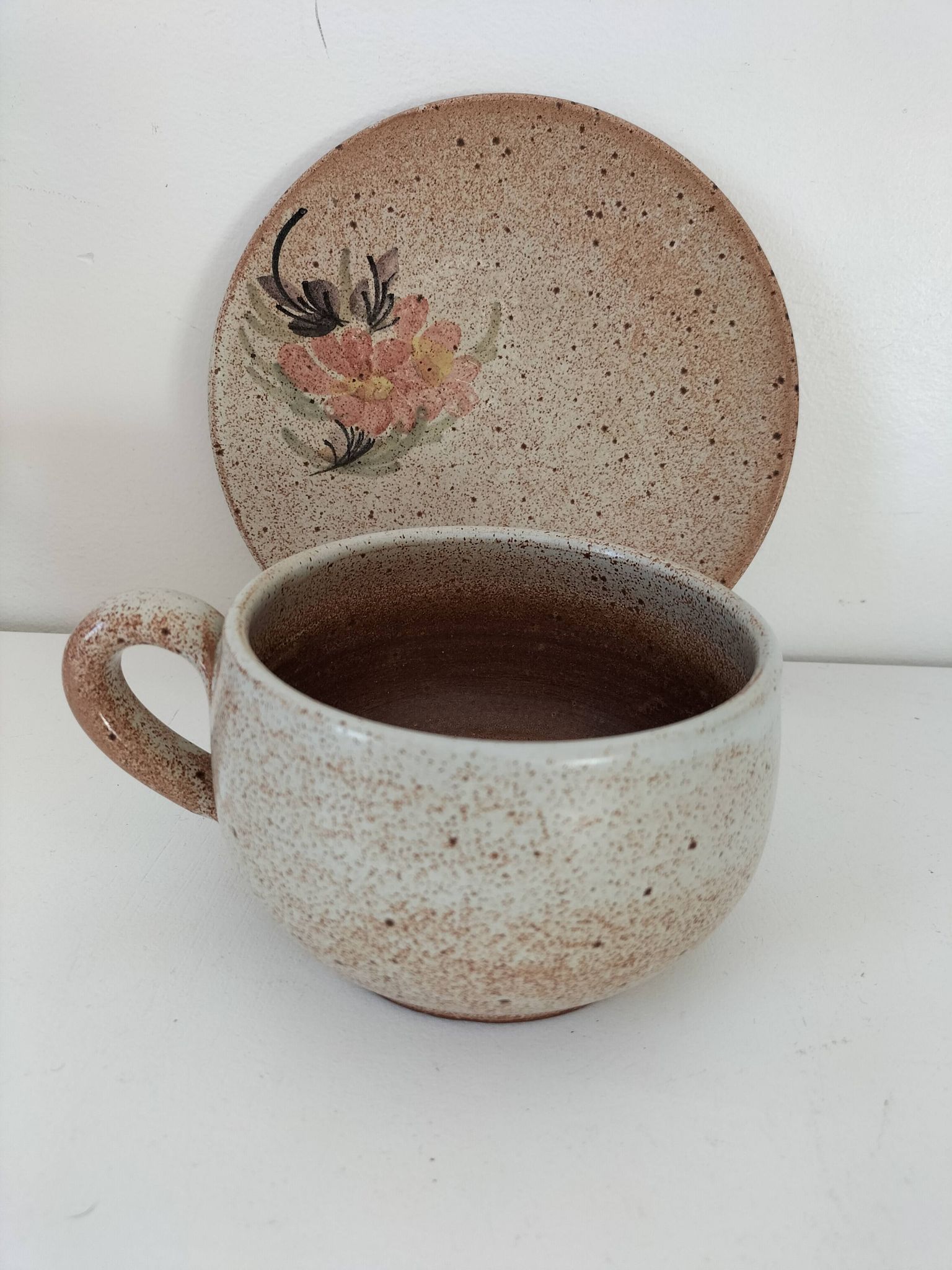 Large stoneware cup and saucer with floral decoration – 1970s