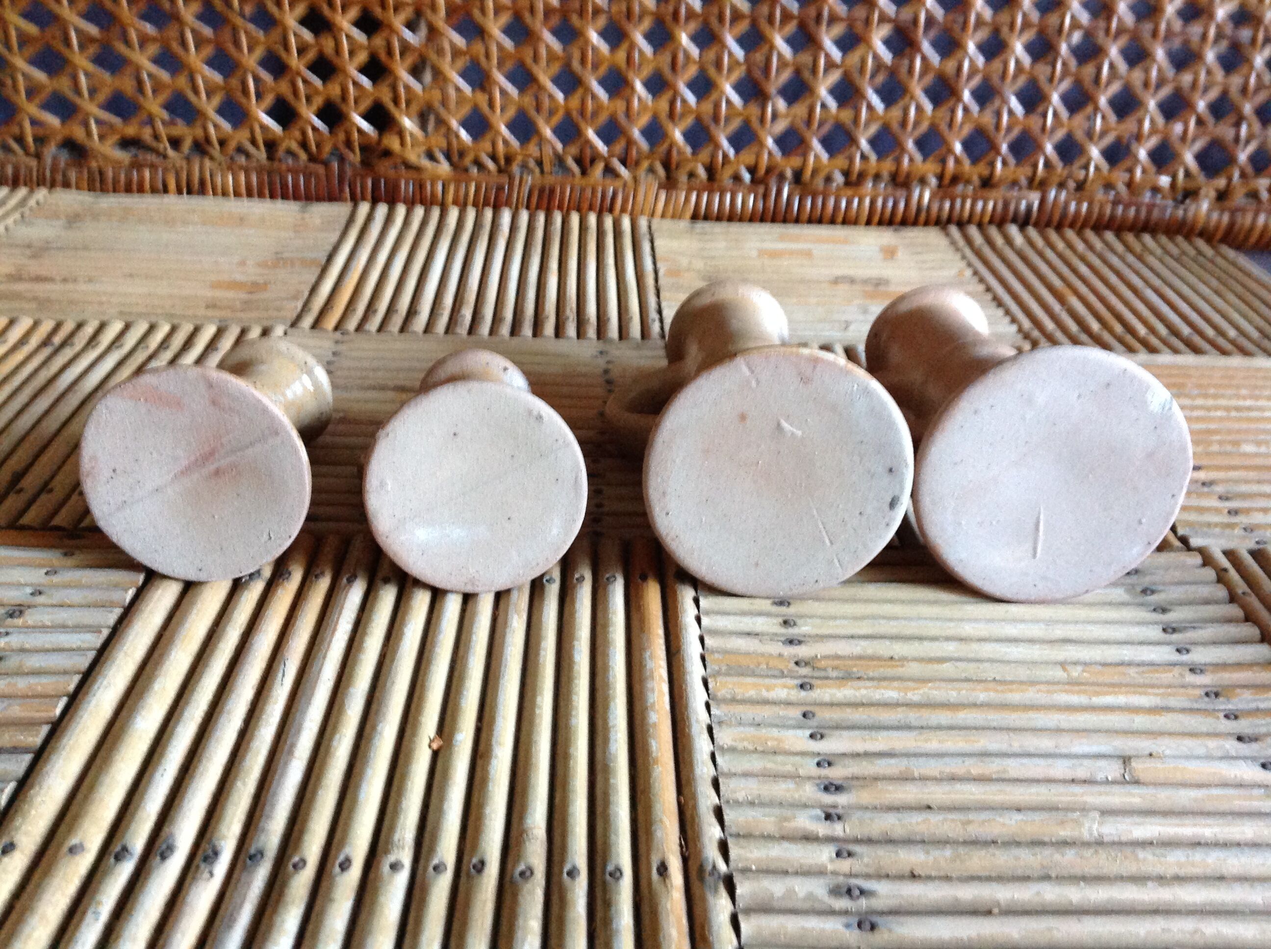 Set of 4 candlesticks in sandstone