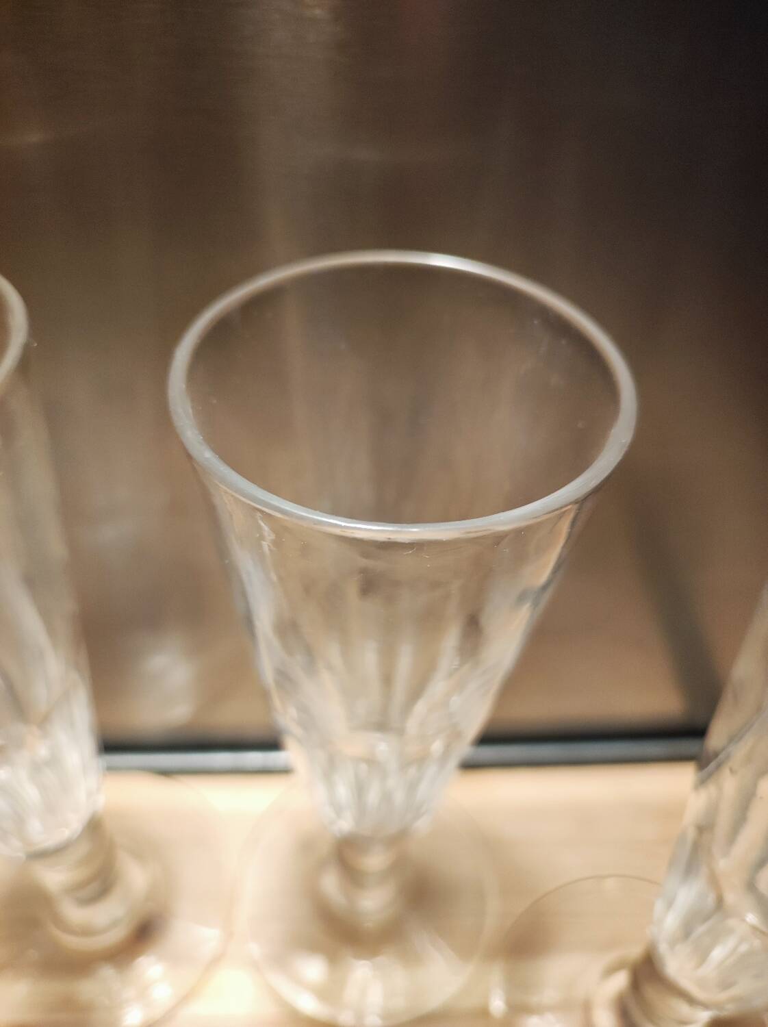 4 champagne flutes with cut sides, late 19th century