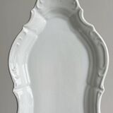 white porcelain plate in an unusual shape